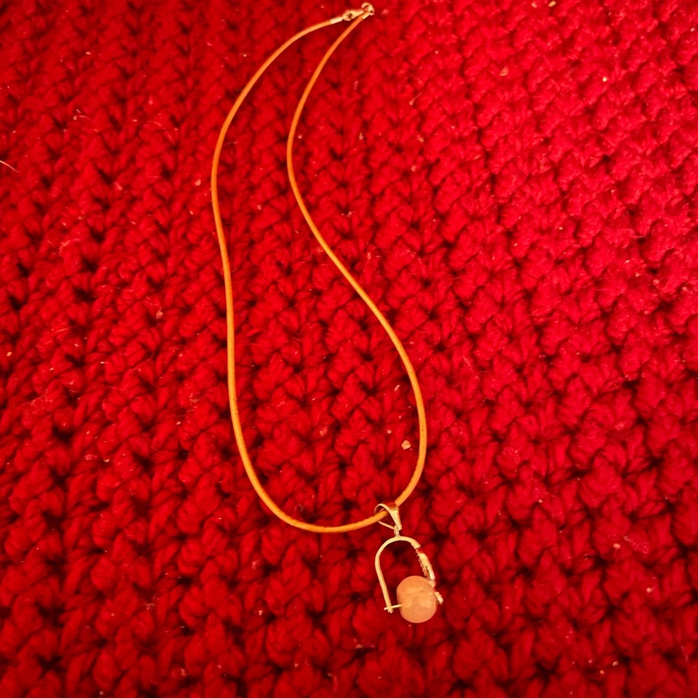 Lovely sterling silver rose quartz pendent with fashion cord.